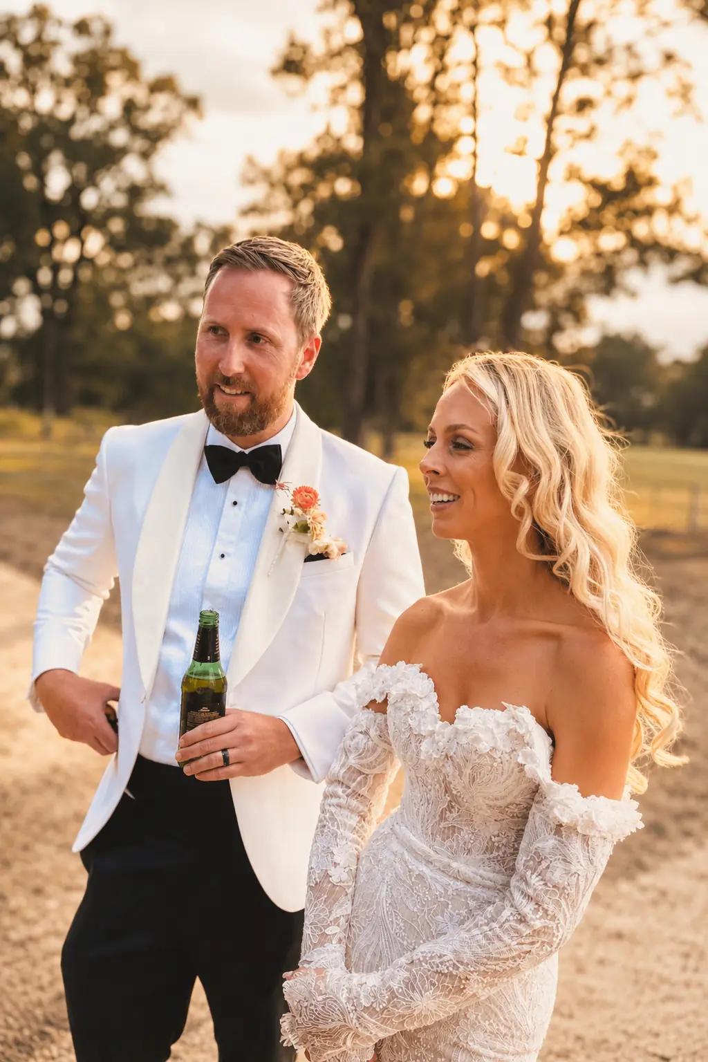 Couple walking together at golden hour on the grounds of Adeline Estate