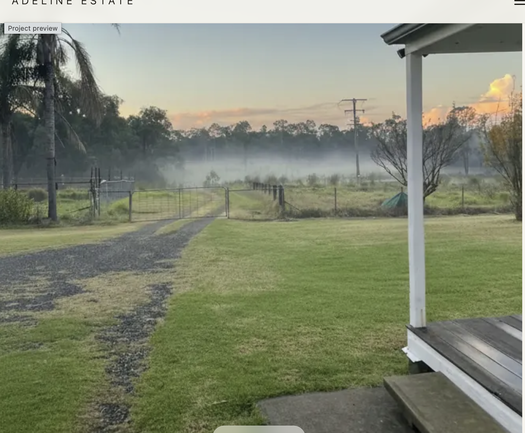 Morning mist over the paddocks and farmhouse at Adeline Estate in the Hunter Valley