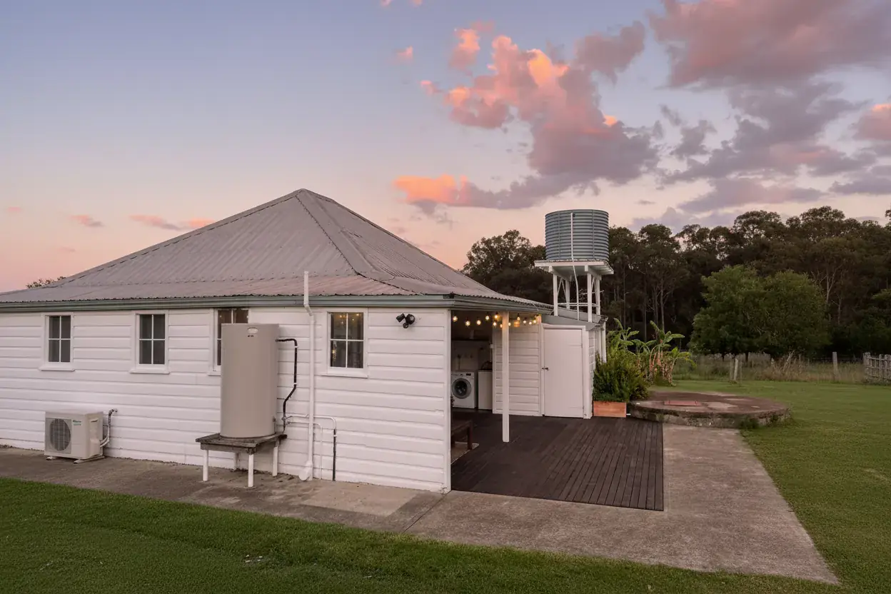 Adeline Estate farmhouse at sunset
