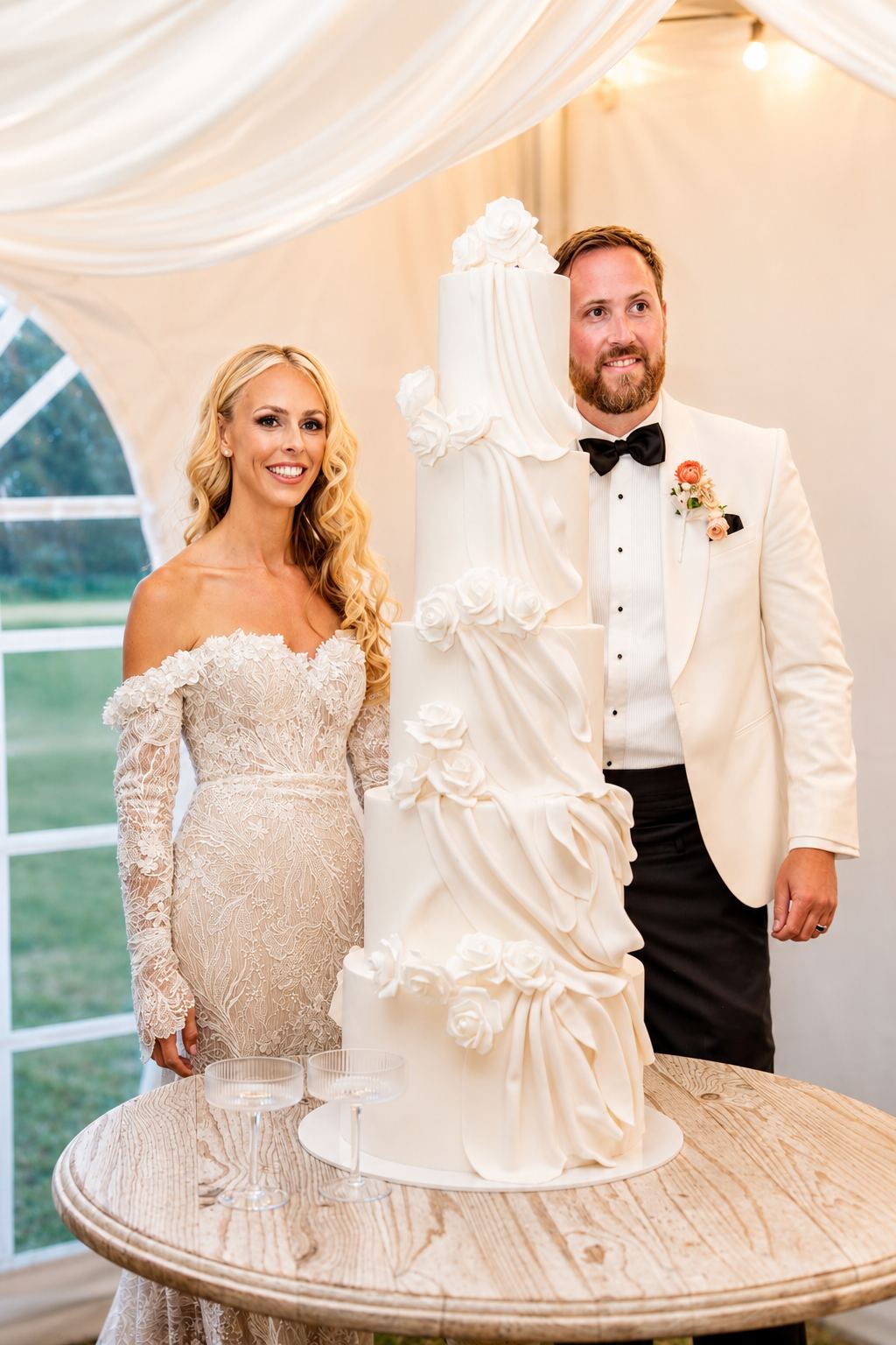 The couple cutting their wedding cake